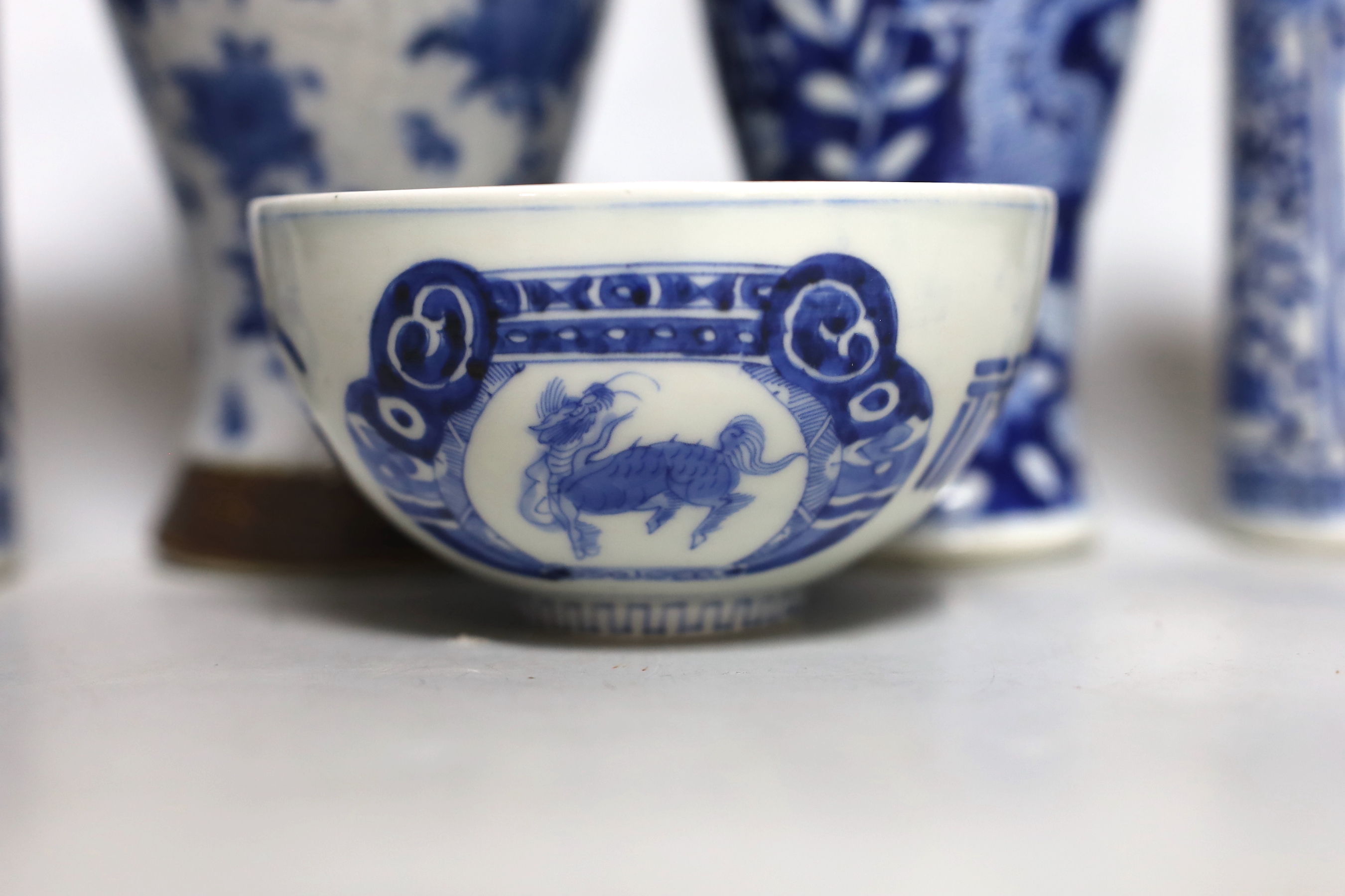 A pair of Chinese blue and white sleeve vases, a crackle ware vase, a dragon vase and a bowl, crackleware vase, 22cm high